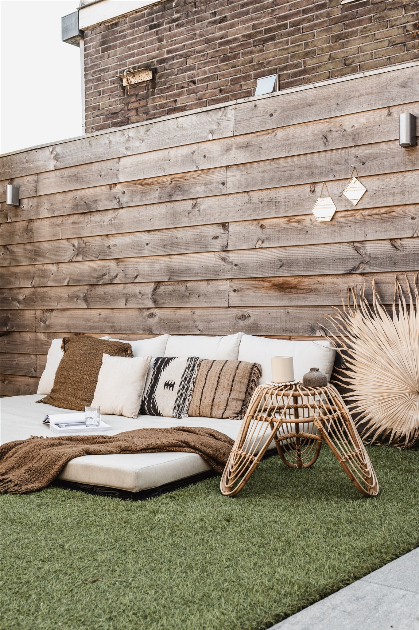 Tuinstyling Ibiza tuin - Kelly Interieur Design - Loungeplek
